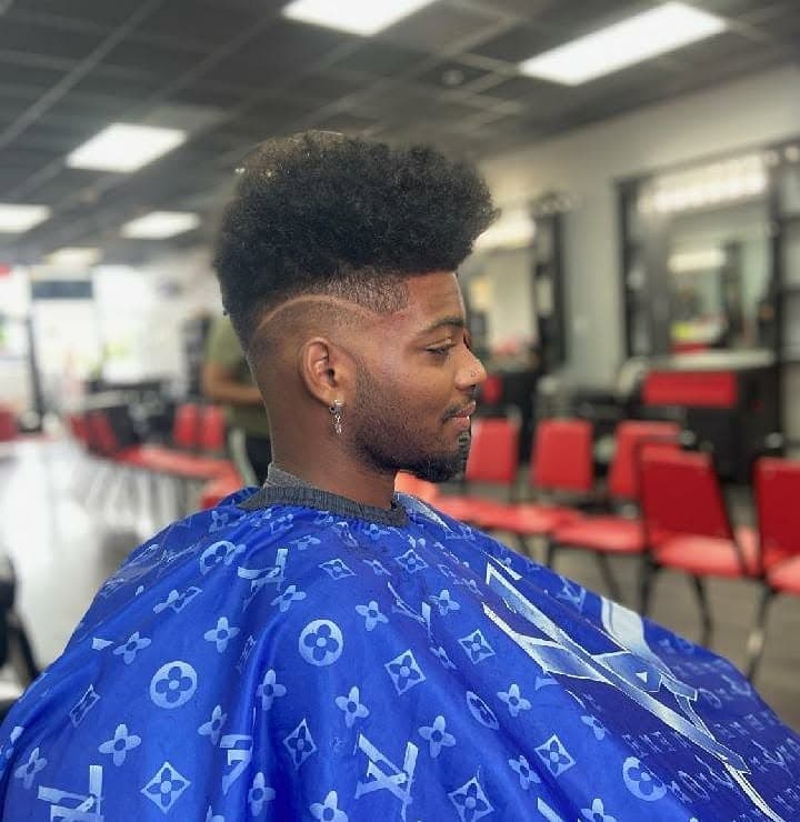 Curly top fade with clean beard lineup